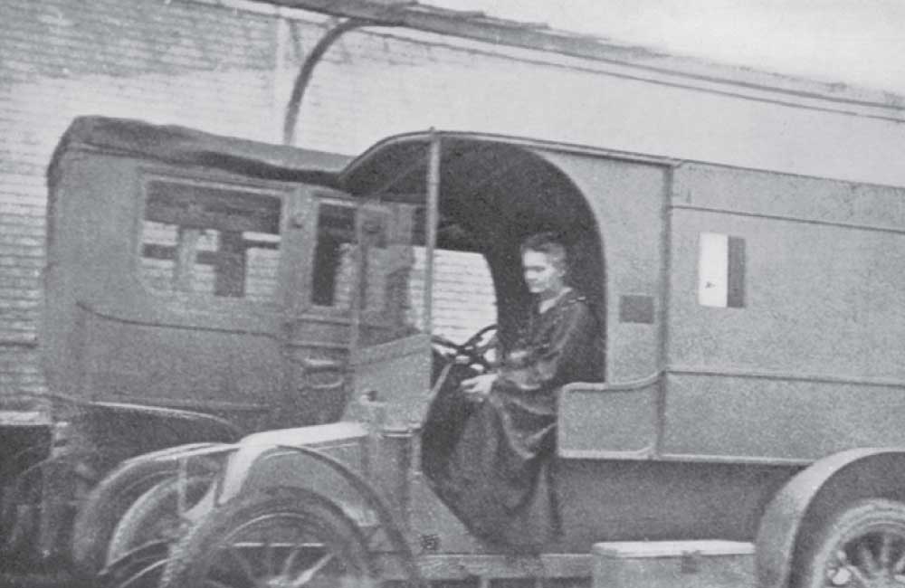 Marie Curie driving a mobile radiology unit, used in World War I field hospitals."