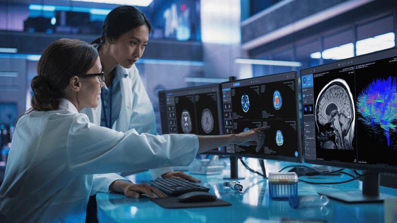 Radiologists reviewing brain MRI scans and AI visualizations on diagnostic monitors